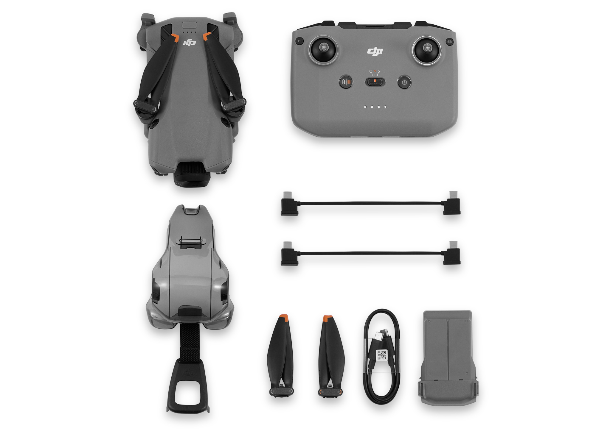 Szary zestaw drona z dronem, pilotem, śmigłami, kablami, baterią i innymi akcesoriami na białej powierzchni.