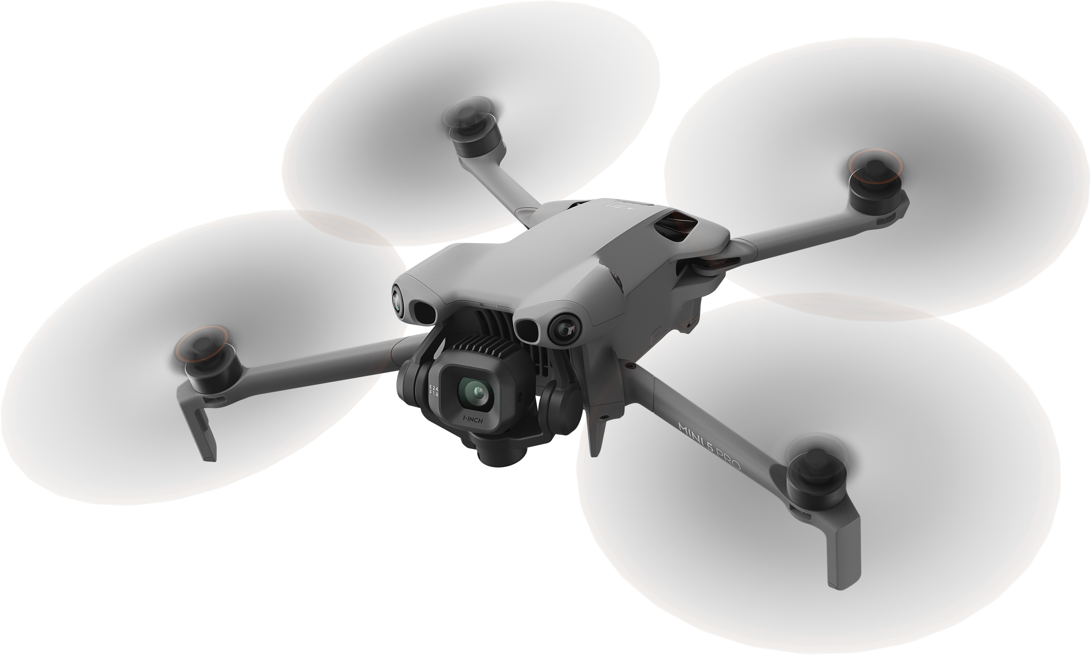 Un drone grigio con eliche rotanti su sfondo nero. La fotocamera del drone è visibile, il nome è Mini 3 Pro.