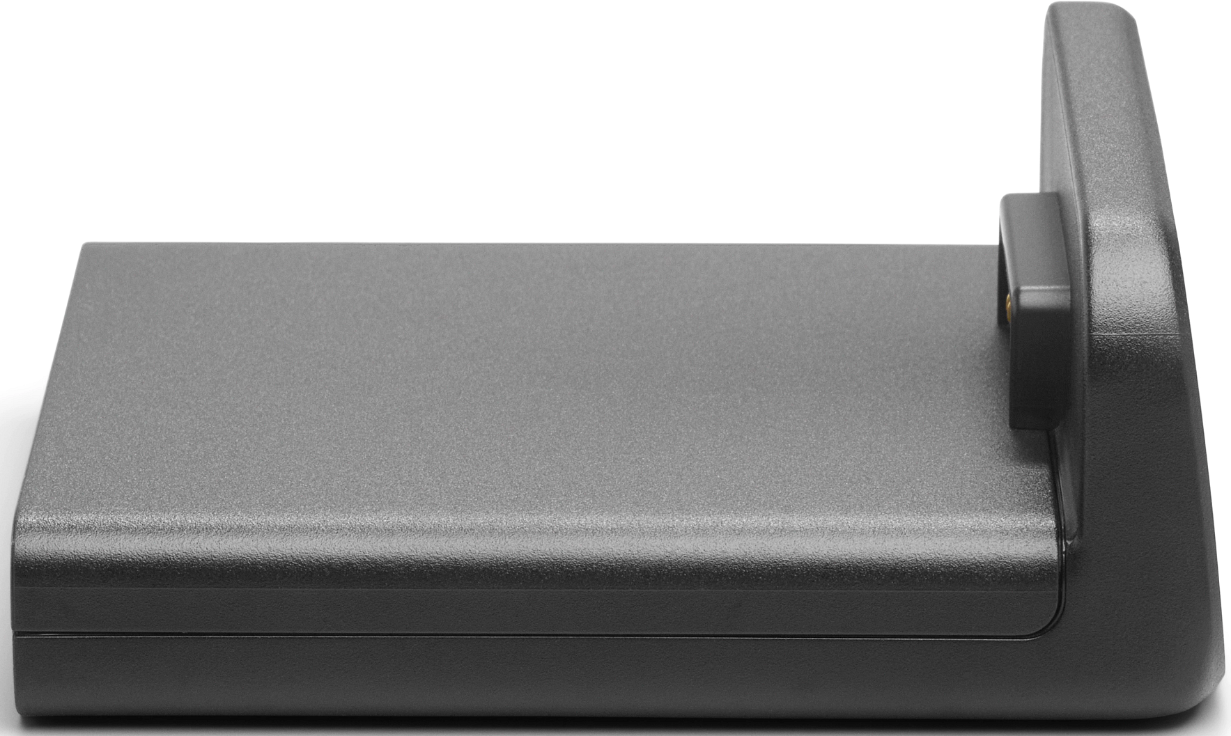 Un appareil rectangulaire gris foncé avec un dos surélevé et un petit composant rectangulaire noir sur le côté. Fond blanc.