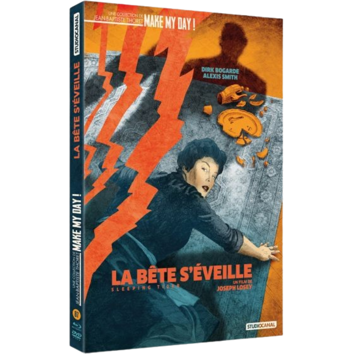 Couverture de DVD avec une femme tendant la main vers un tapis. Éclairs oranges et texte en français. Titre : La Bête S'éveille, Make My Day !