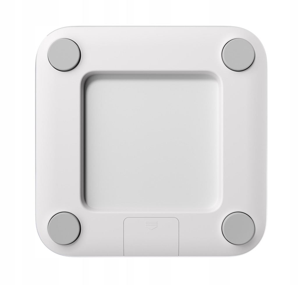 Widok z góry na białą kwadratową wagę z zaokrąglonymi rogami. Szare, okrągłe nóżki w każdym rogu. Środek to zagłębiony kwadrat.