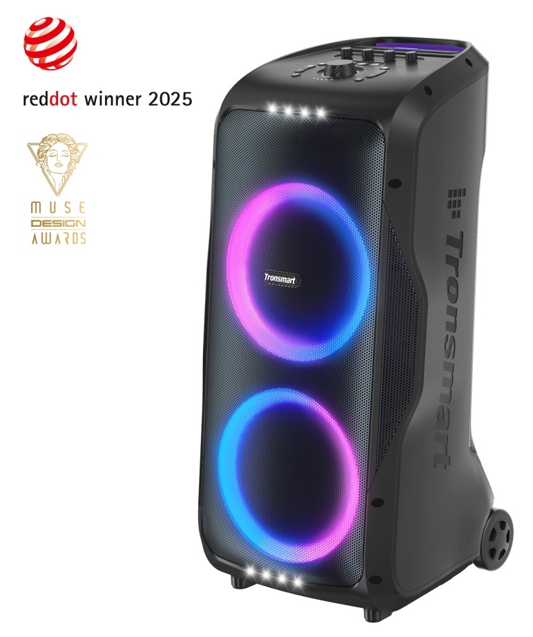 Czarny głośnik Tronsmart z dwoma podświetlanymi pierścieniami w kolorze różowym i niebieskim. Widoczne koła i logo nagród.