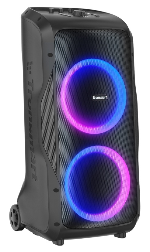 Czarny głośnik Tronsmart z kółkami. Ma dwa świecące okręgi z różowymi i niebieskimi światłami. Głośnik jest na białym tle.