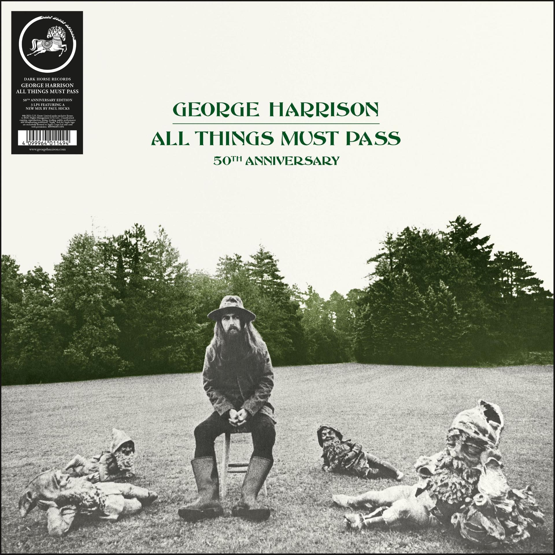 Album borítója. George Harrison egy mezőn ül törpékkel. Fák a háttérben. Album címe és évfordulós szöveg.