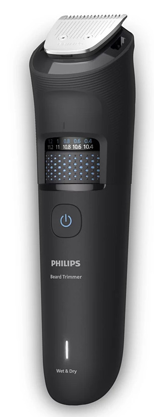 Czarna maszynka do brody Philips. Posiada srebrne ostrze, wyświetlacz LED i przycisk zasilania. Oznaczona jako Wet & Dry.