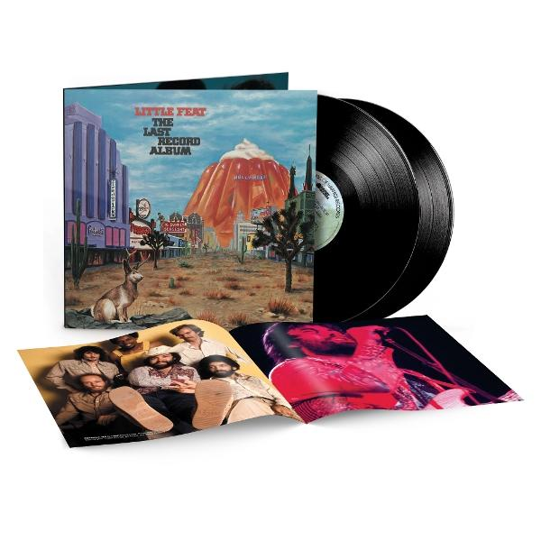 Albumcover von Little Feats 'The Last Record Album' mit Schallplatten. Enthält Bandfoto und Wüstenlandschaft mit Hollywood-Schriftzug.