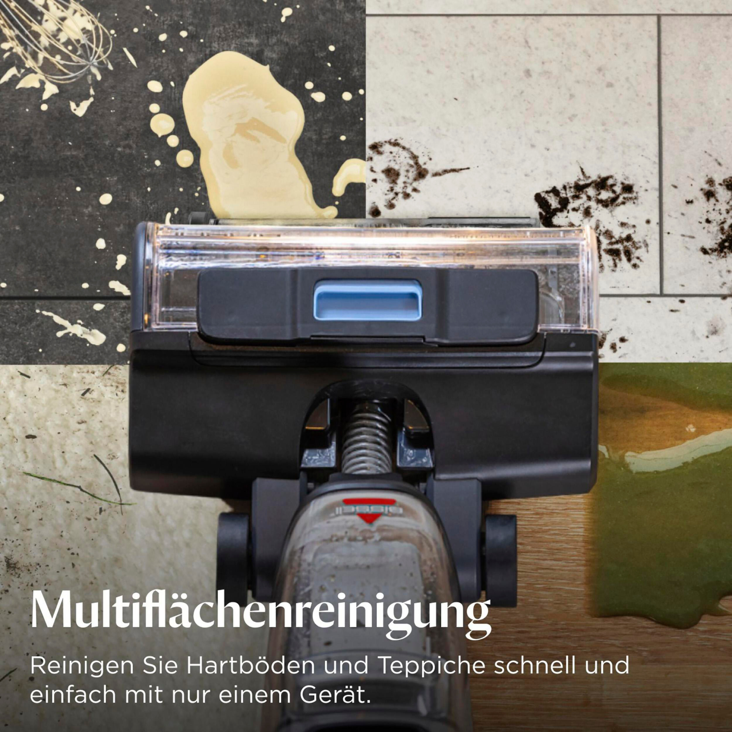 Ein Staubsauger reinigt schmutzige Oberflächen. Auf dem Boden befinden sich Flecken von Flüssigkeiten und Lebensmitteln.
