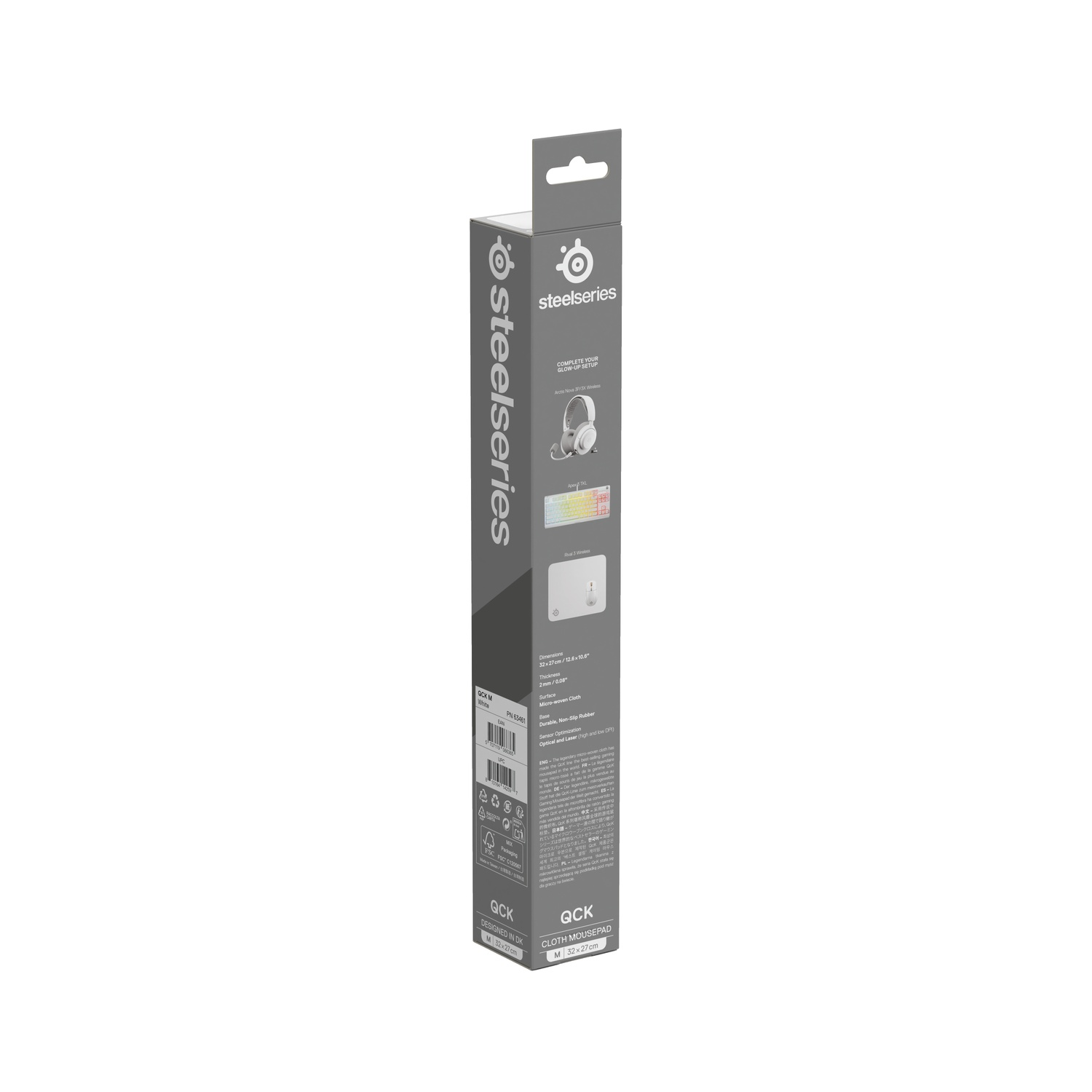 Een SteelSeries QCK-muismatdoos. Het toont een witte muismat, een headset en toetsenbordafbeeldingen. De doos is zwart en wit.