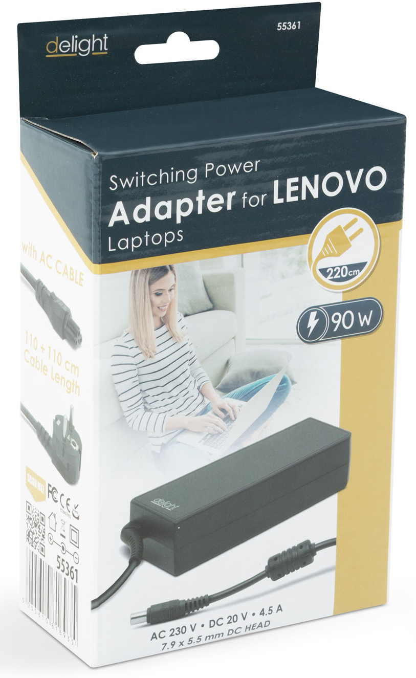 Lenovo laptop adapter a dobozban. Tartalmaz váltóáramú kábelt, 90 W-ot és specifikációkat. A képen egy laptopot használó személy látható.