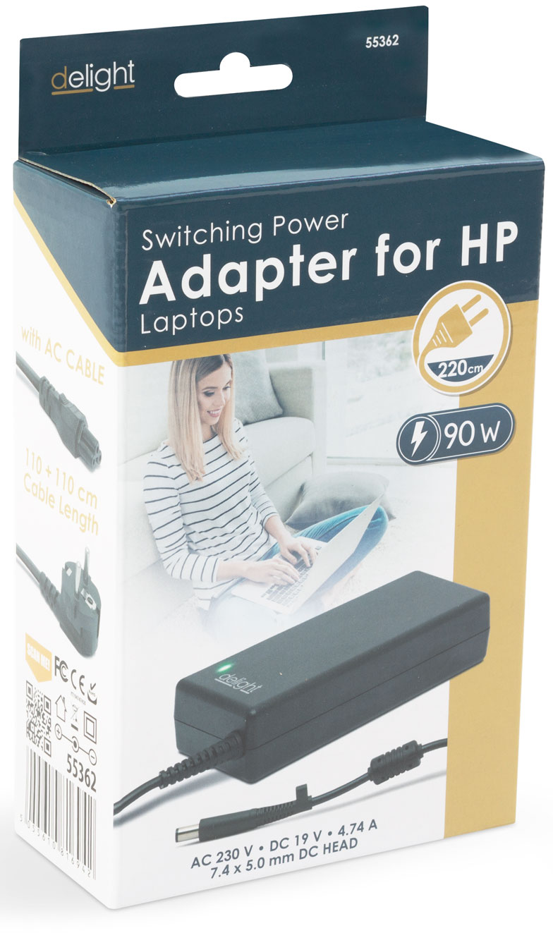 Doboz, amely egy Switching Power Adaptert mutat HP laptopokhoz. Egy nő laptopot használ. Az adapter fekete.