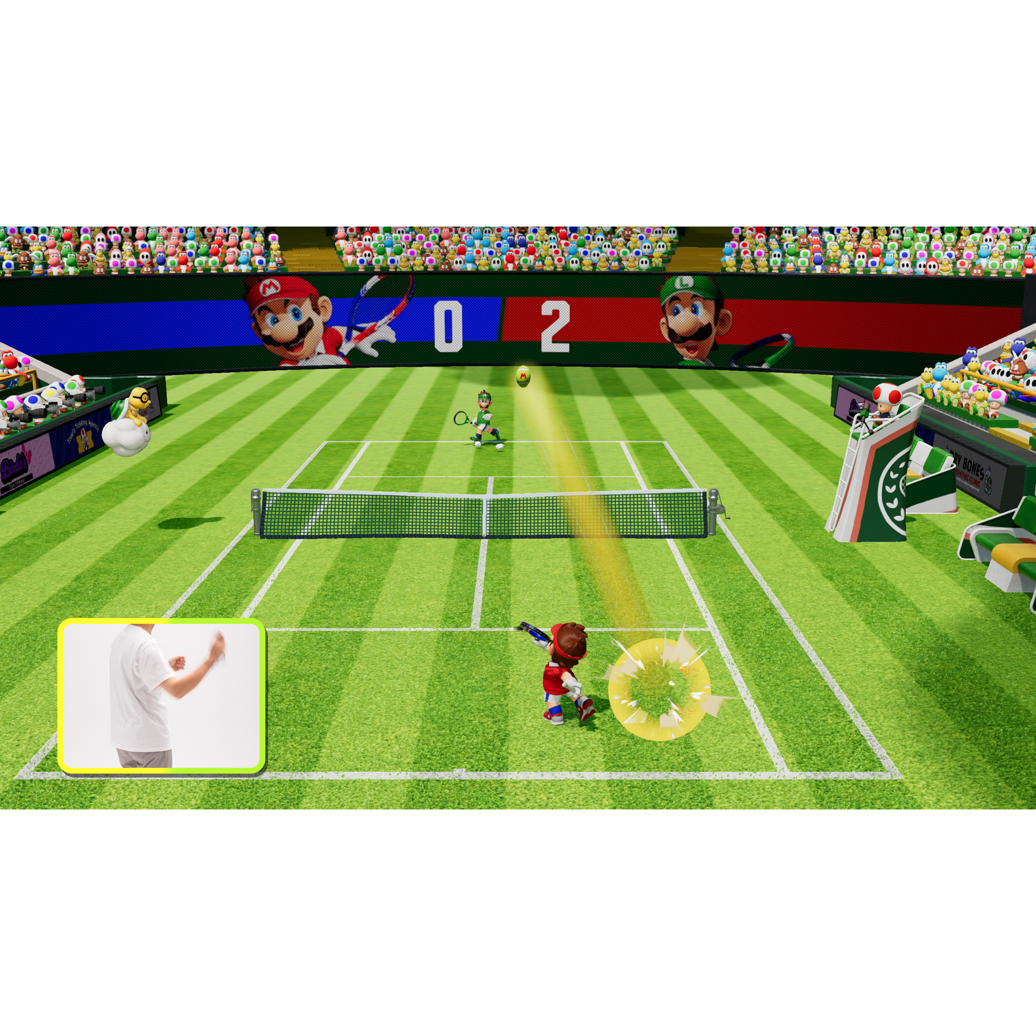 A tennis match with Mario characters. Score is 0-2. A player in red hits the ball. Mario and Luigi are cheering from the stands.