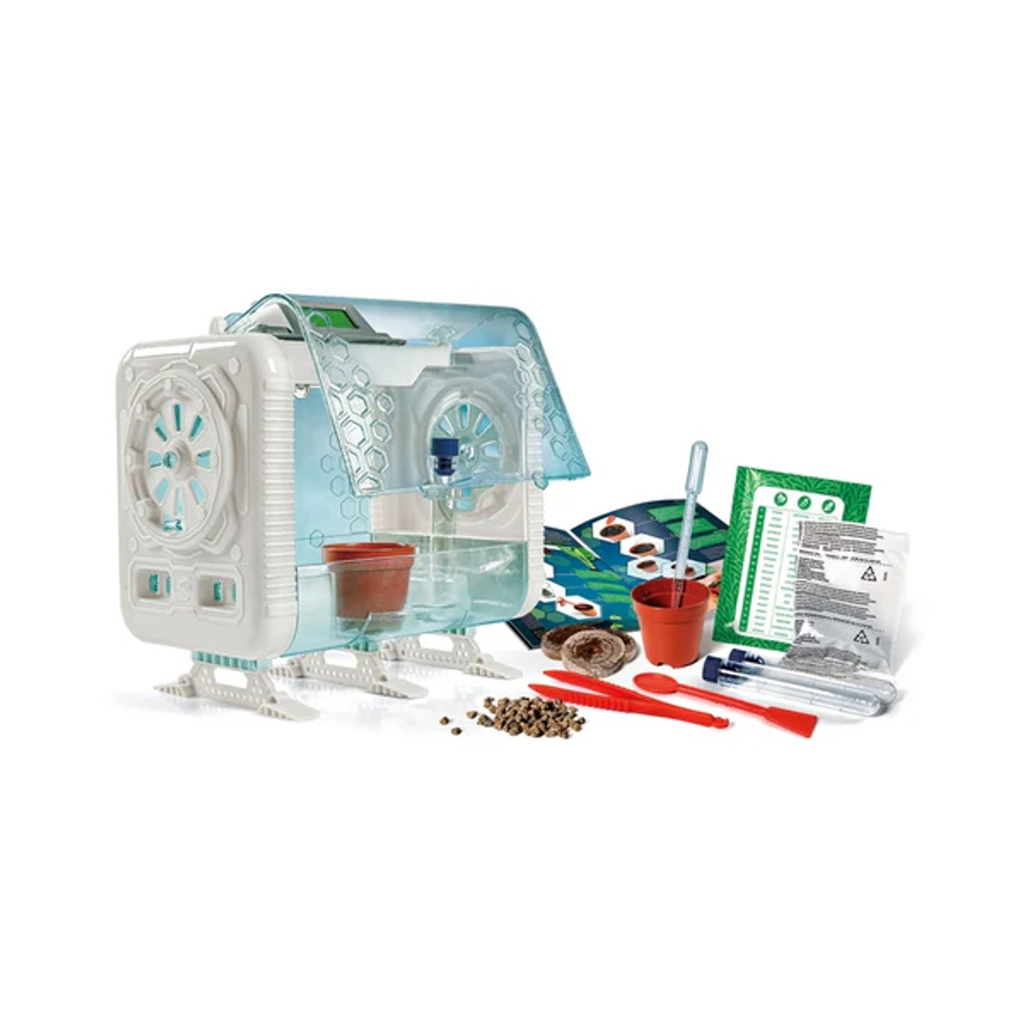 Un kit di coltivazione di piante bianco e blu. Include una cupola trasparente, vasi, semi, strumenti e istruzioni. Il kit è su una superficie bianca.