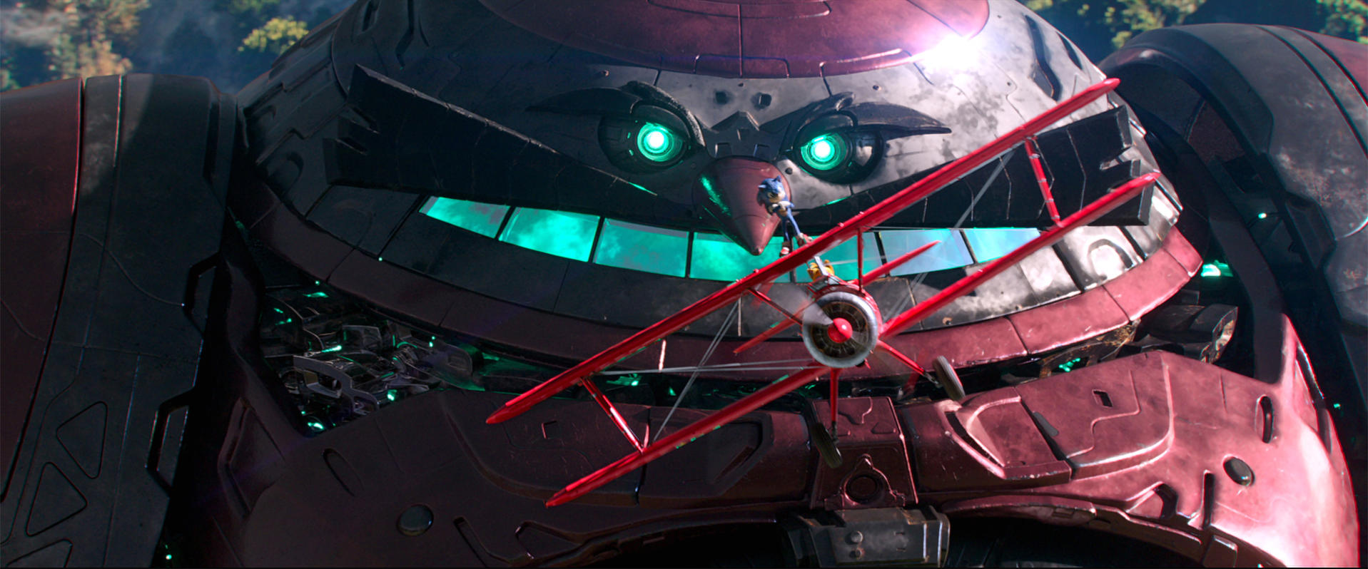 Sonic und ein Doppeldecker stehen vor einem riesigen Roboter mit grün leuchtenden Augen und einem Mund. Der Roboter ist kastanienbraun und schwarz.