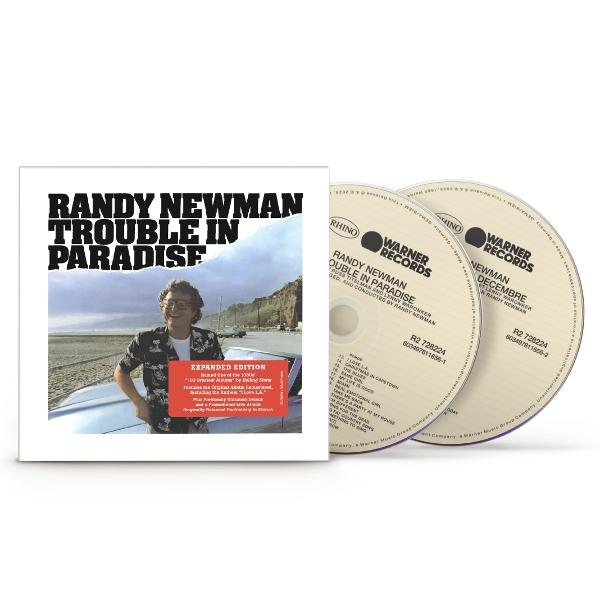 Albumcover von 'Randy Newman: Trouble in Paradise' mit CDs. Newman steht am Strand neben einem Auto.