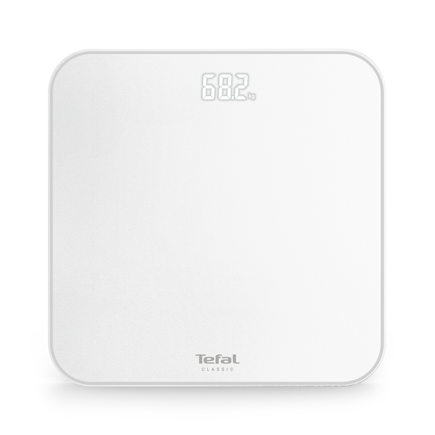 A white Tefal Classic digital scale. The display shows 68.2 kg. The scale is on a white surface.