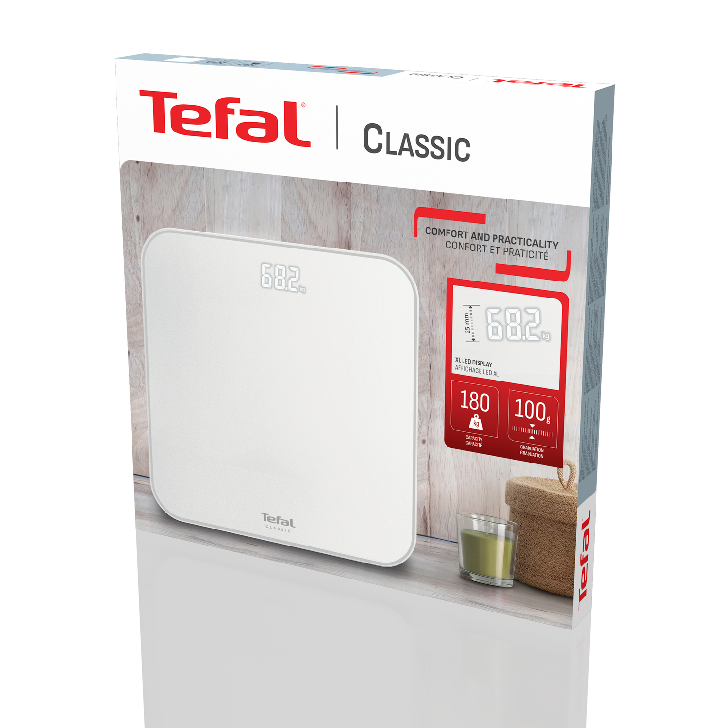 A Tefal Classic scale box. It shows 68.2 kg on the digital display. A candle and a small basket are visible in front of the box.