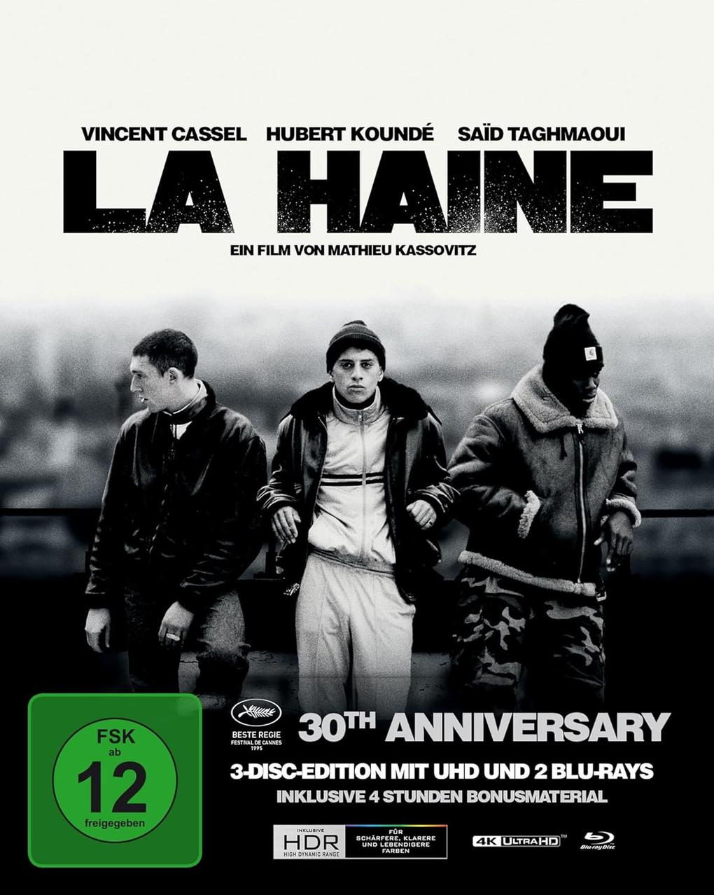 Filmposter für La Haine. Drei Männer stehen zusammen. Der Text enthält den Titel, Namen und Details zur Veröffentlichung.