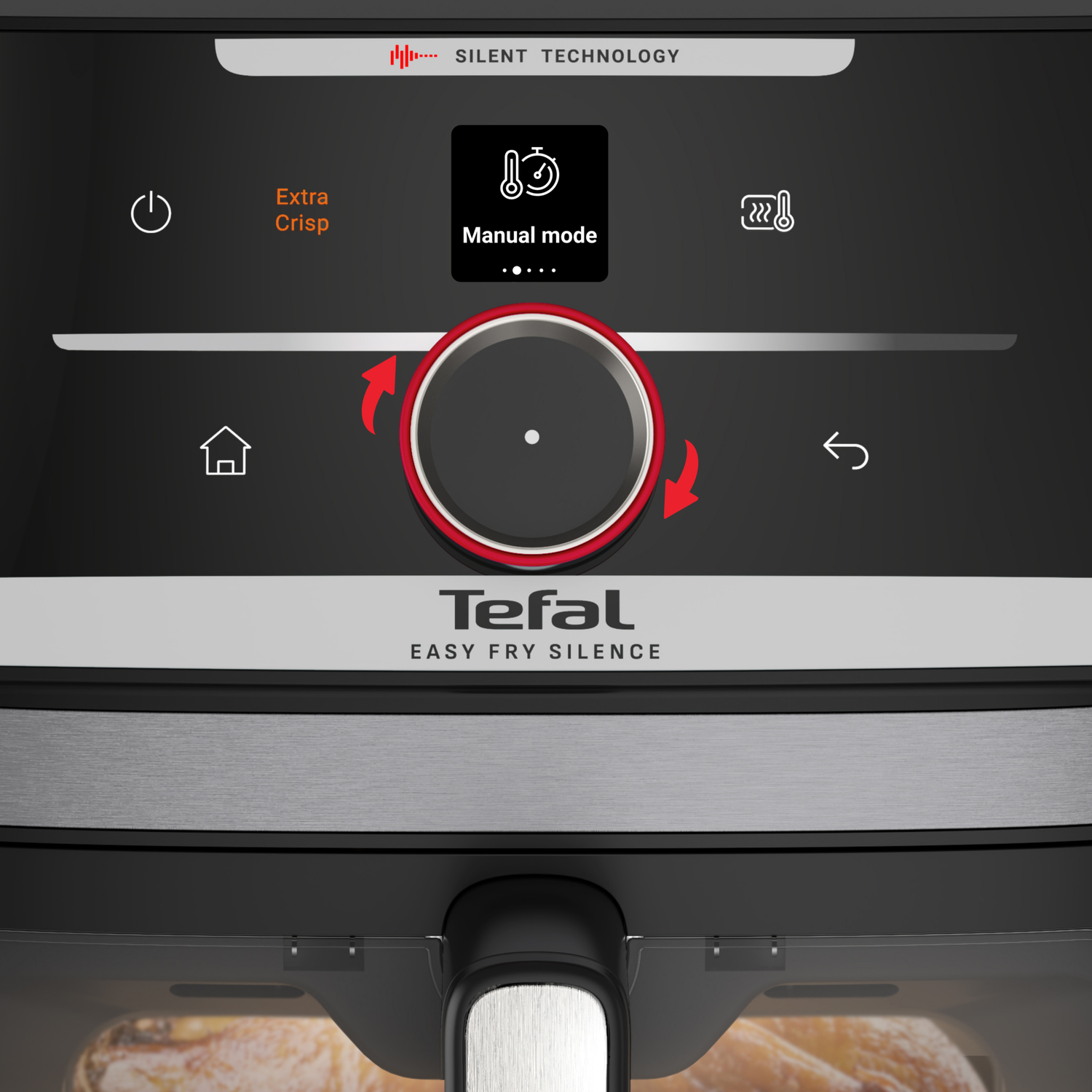 Close-up of an air fryer control panel. Black background with white icons and text. A large, rotating dial with red arrows.