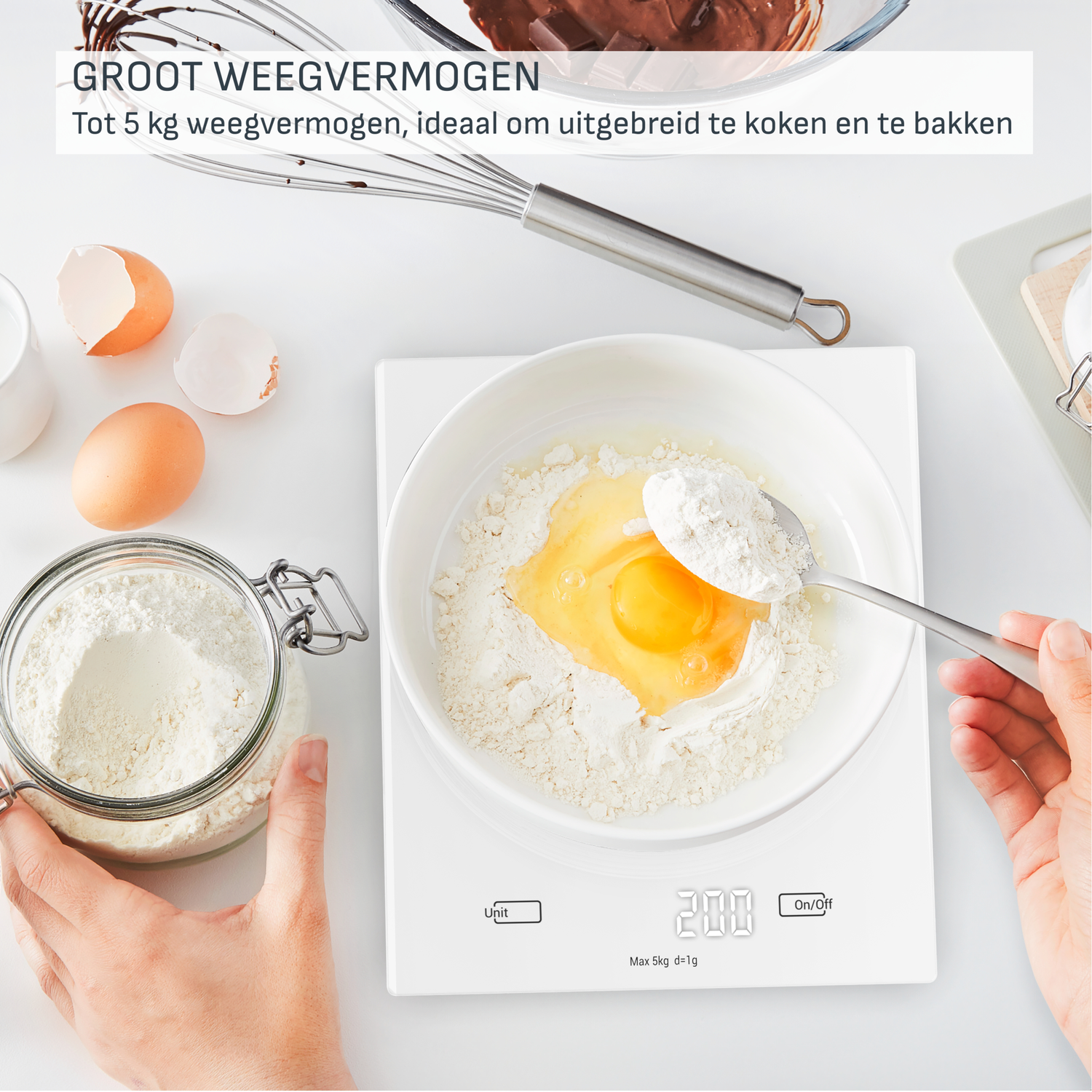 A person is adding flour to a bowl containing an egg and flour, placed on a digital scale. Flour jar and eggs are also visible.