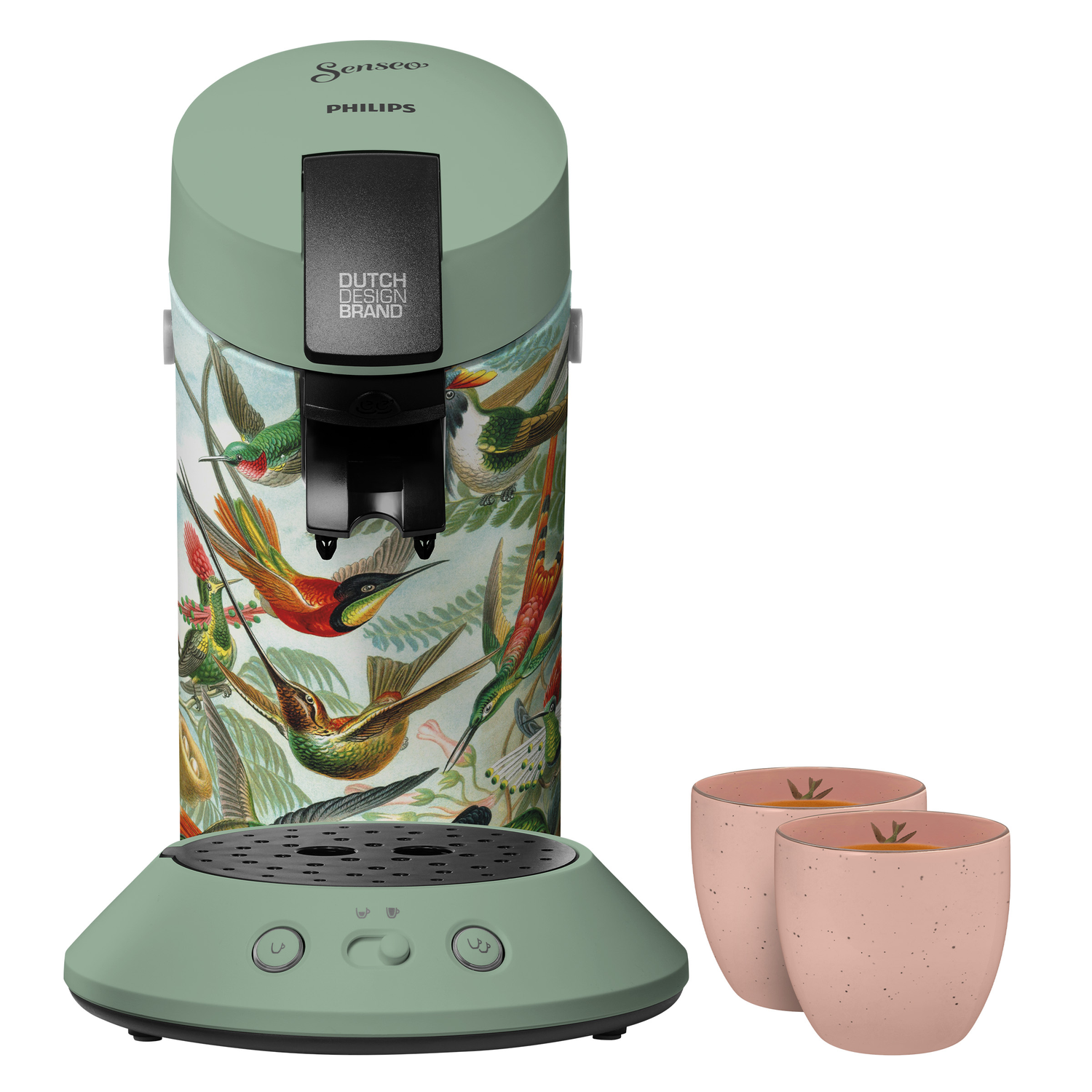 A green and patterned coffee machine with two pink cups. The machine has hummingbird designs.