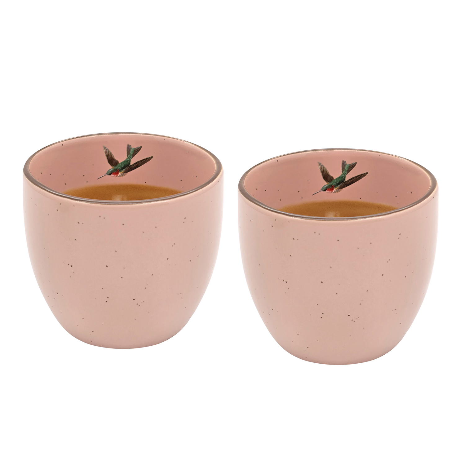 Two pink cups with coffee inside. Each has a hummingbird illustration. The background is plain white.