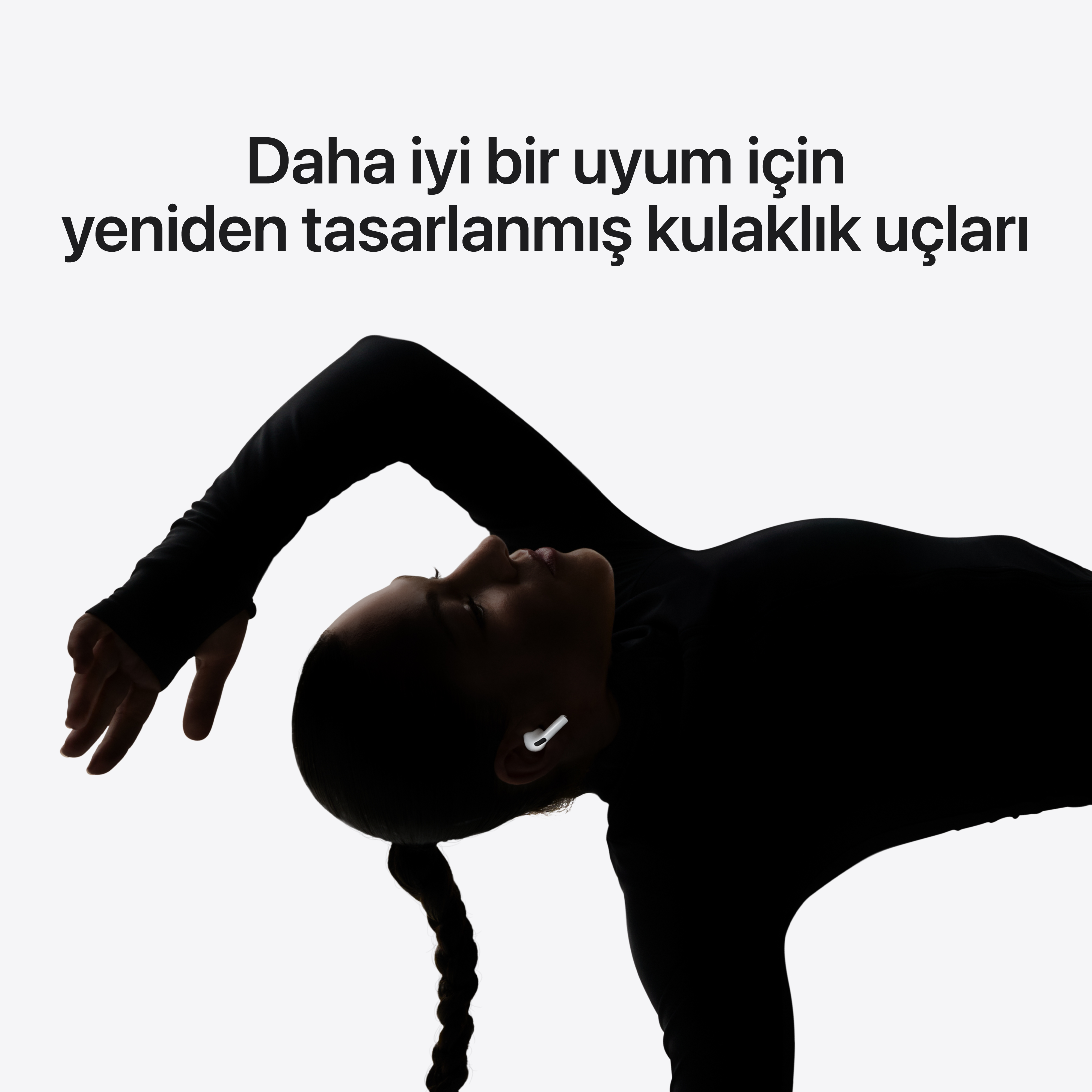Kulaklıklı bir kişinin silüeti. Türkçe metin: Daha iyi bir uyum için, yeniden tasarlanan kulaklık uçları.