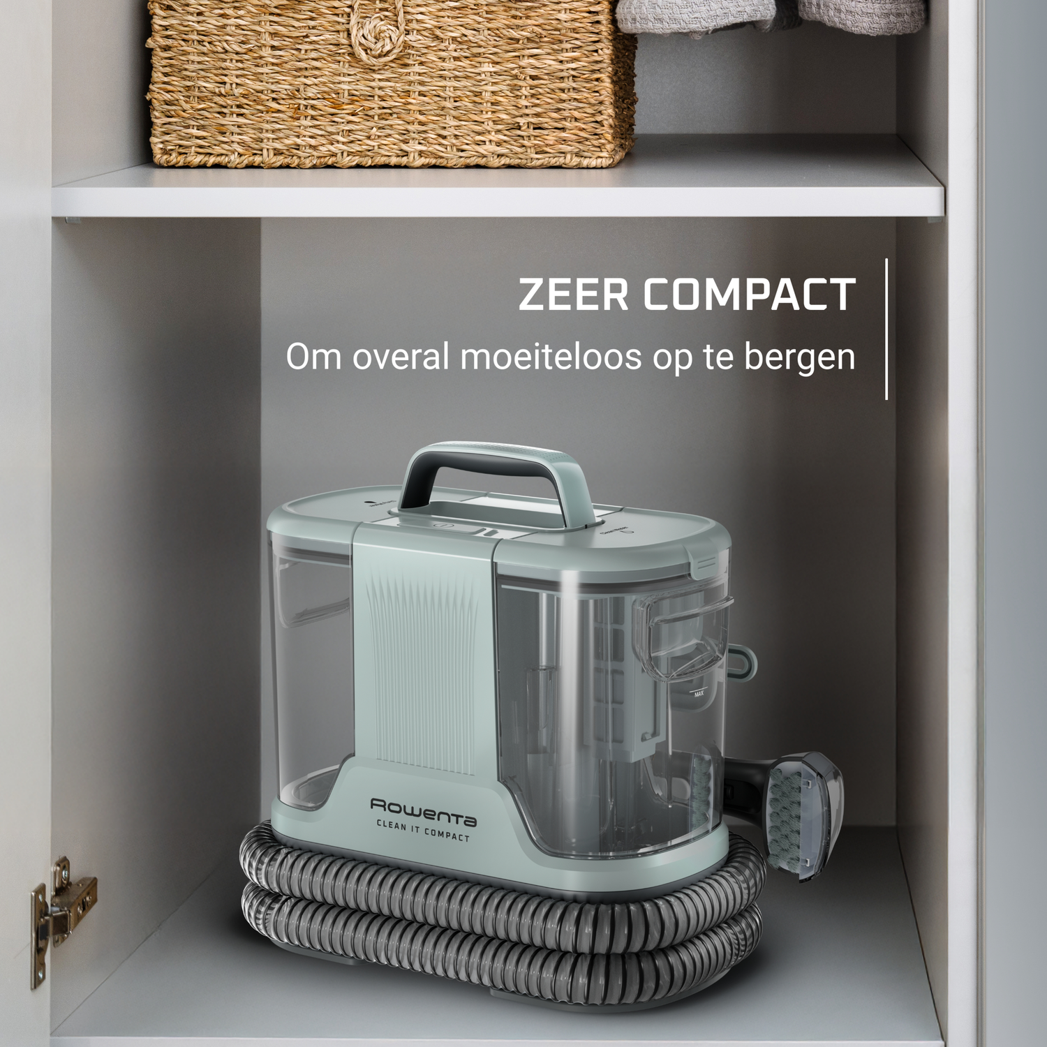 A compact Rowenta cleaner in a cabinet. It has a handle, hose, and nozzle, with text reading 'ZEER COMPACT'.