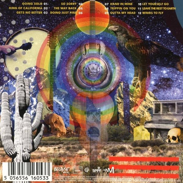 Albumcover mit psychedelischem Design. Gitarre, Adler, Regenbogen und Wüstenlandschaft. Text enthält Songtitel und einen Barcode unten.