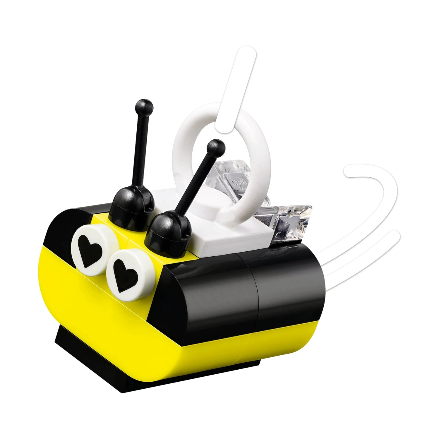 Un'ape Lego fatta con blocchi gialli, neri e bianchi. Ha occhi a forma di cuore e antenne. Lo sfondo è bianco.