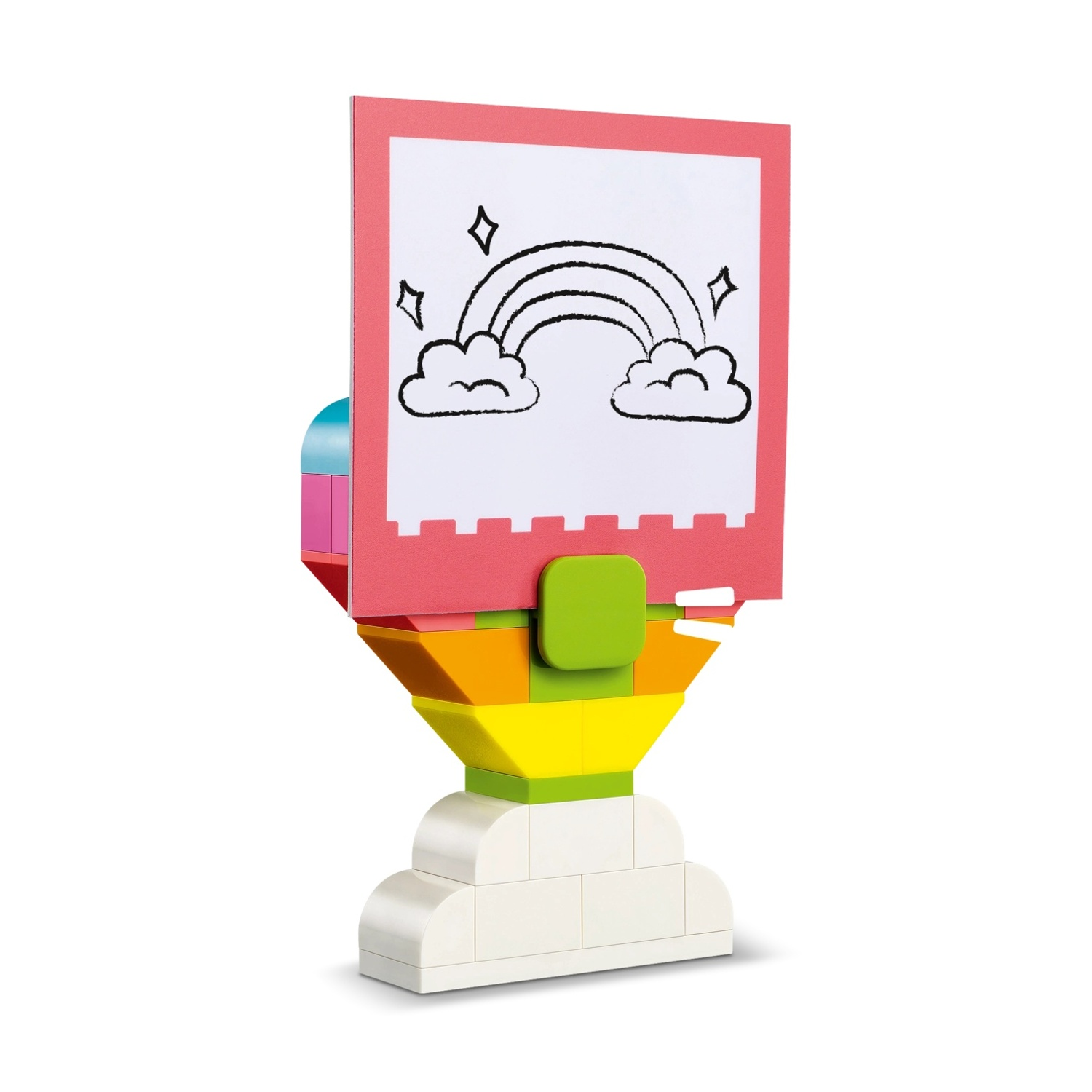 Un giocattolo colorato fatto di blocchi. Presenta un disegno di un arcobaleno e nuvole su sfondo rosso. Base bianca e parti colorate.