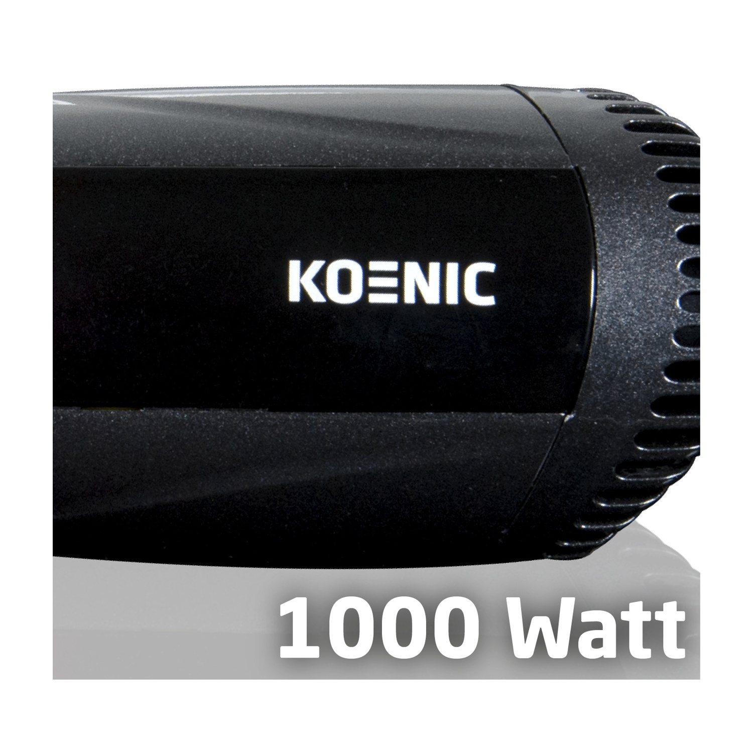 Primo piano di un asciugacapelli nero. Il marchio 'KOENIC' è visibile. Sotto, il testo '1000 Watt' è visualizzato.