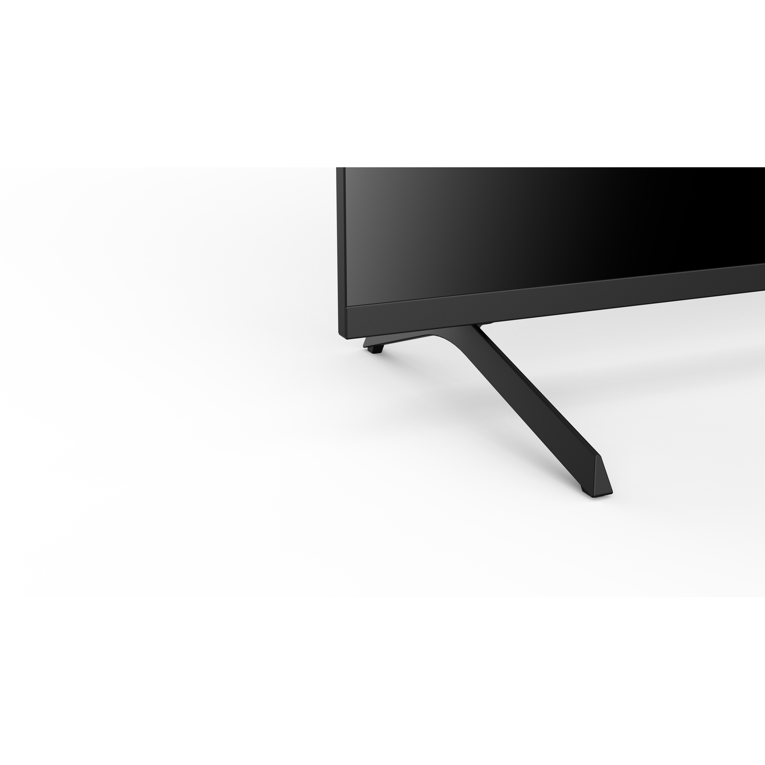 A black flat-screen TV is shown from a low angle, with a black stand. The background is plain white.