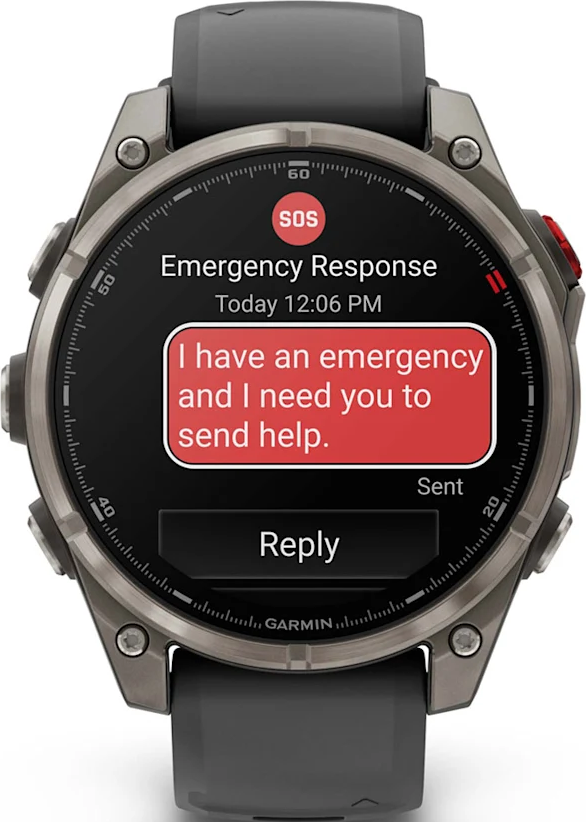 Une smartwatch Garmin affiche un message d'urgence : 'J'ai une urgence et j'ai besoin d'aide'. L'icône SOS est visible.