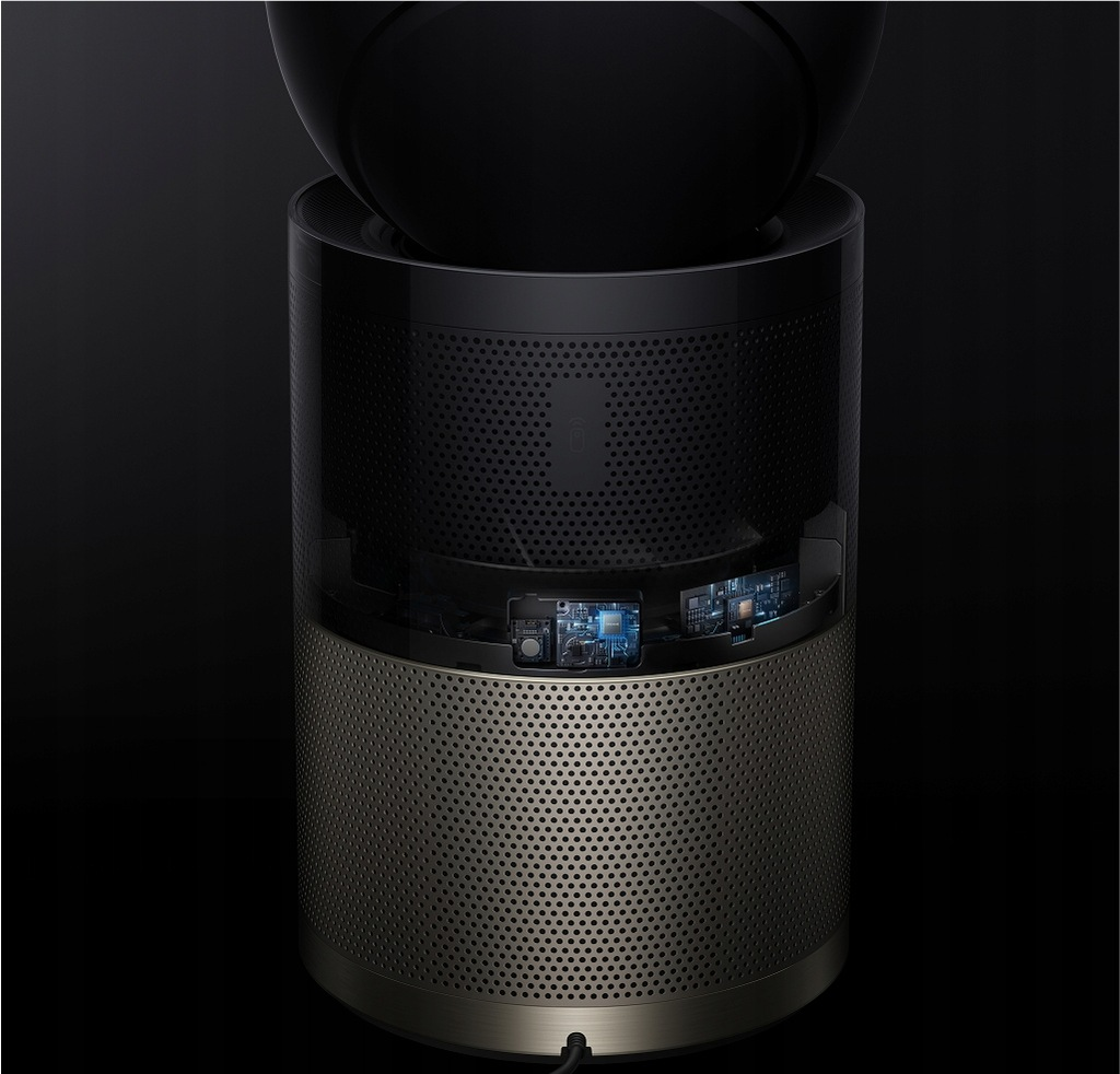 Czarny i złoty cylindryczny oczyszczacz powietrza z perforowaną konstrukcją. Na górze czarny kulisty kształt. Widoczne wewnętrzne płytki obwodów.