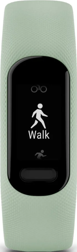Un fitness tracker verde menta visualizza un'icona di camminata con la parola 'Walk'. Il cinturino ha un motivo strutturato.
