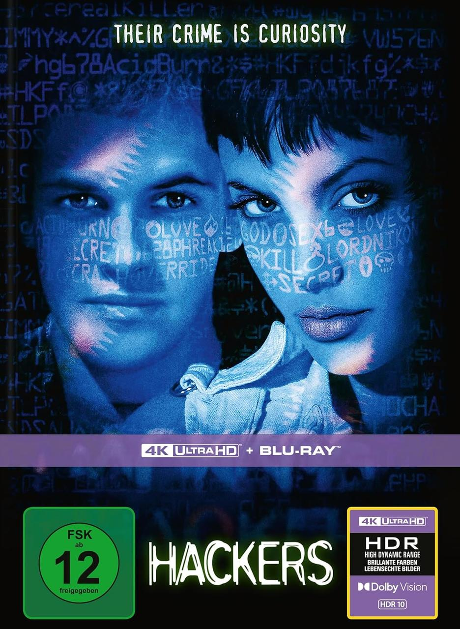Filmposter für Hackers. Zwei Gesichter überlappen sich, Text überlagert auf ihren Gesichtern. Text oben: Their Crime Is Curiosity.
