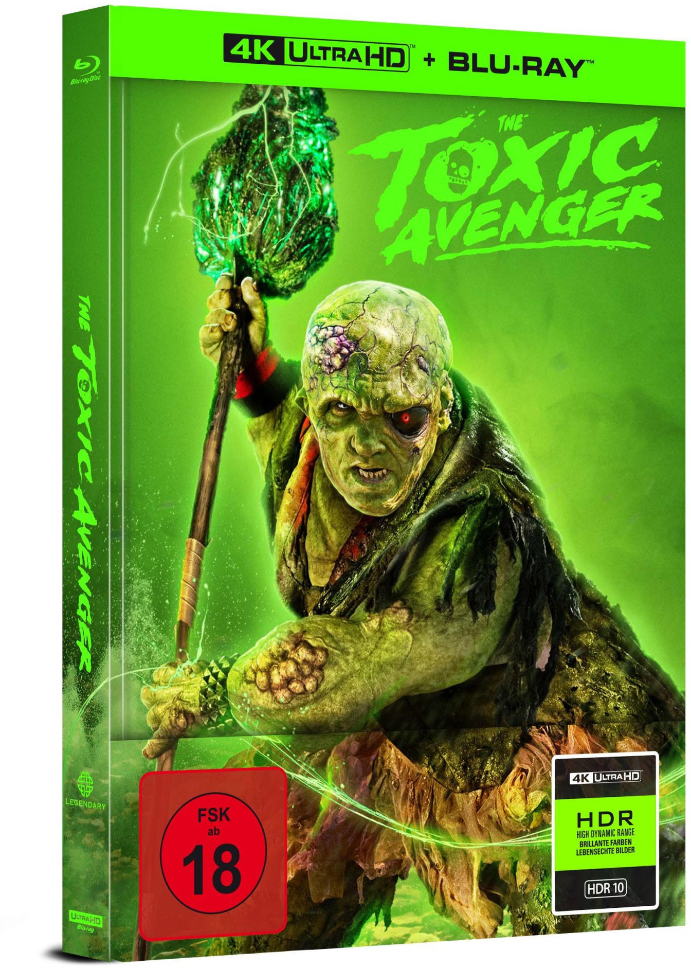 Das Cover der Blu-ray von The Toxic Avenger. Ein grüngesichtiger Monster hält einen Stab. Der Hintergrund ist hellgrün.