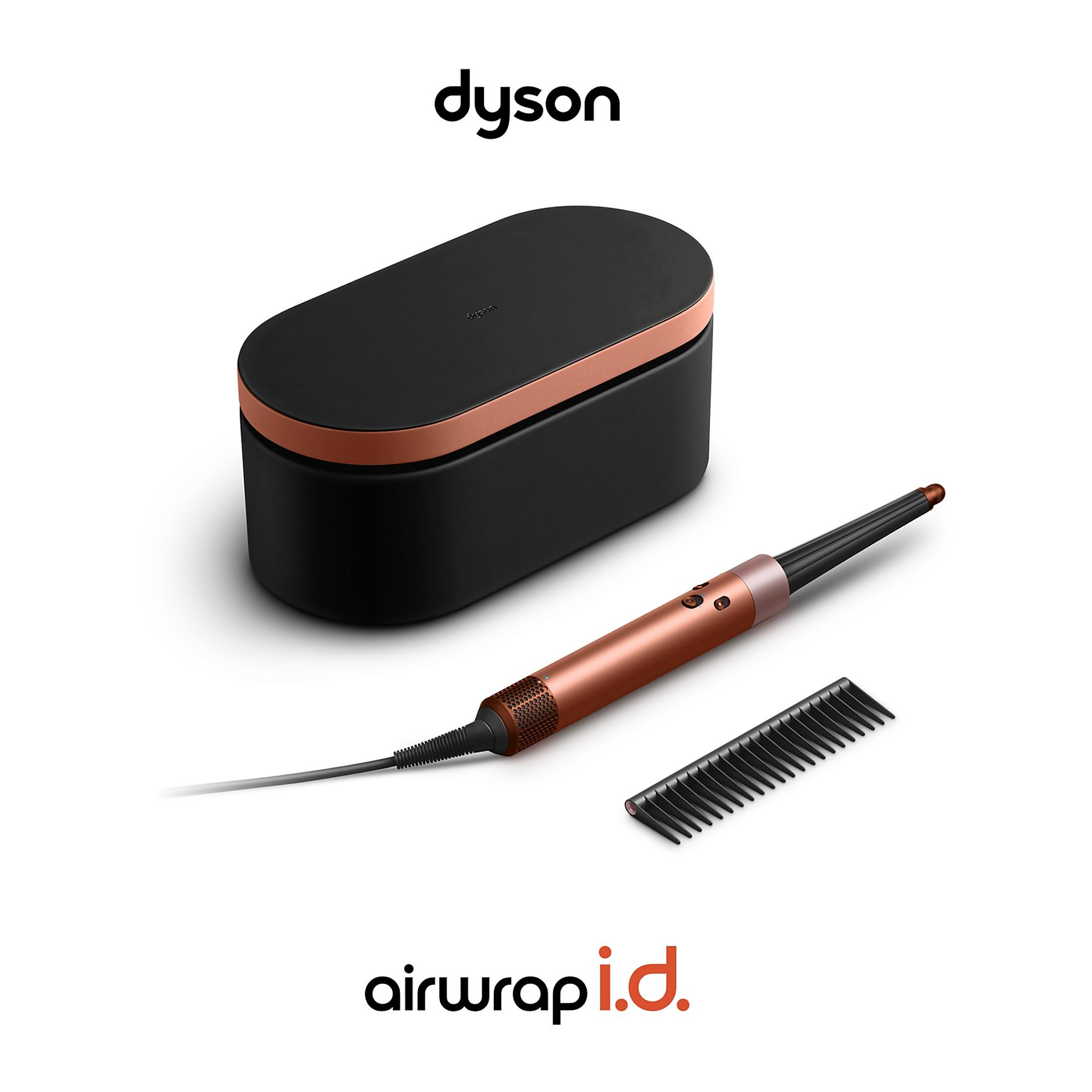 Zestaw do stylizacji Dyson Airwrap. Obejmuje czarną i miedzianą walizkę do przechowywania, stylizator i grzebień na białym tle.