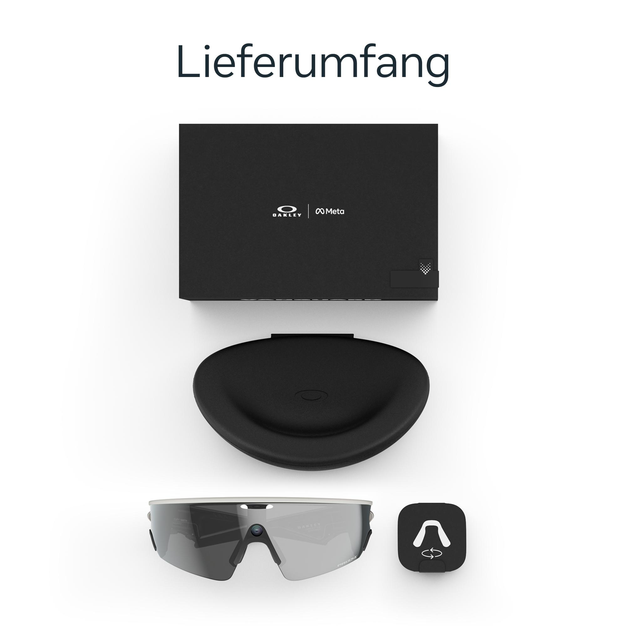 Ein Bild zeigt eine Oakley Meta-Brille und Zubehör, darunter ein Etui und eine Box, auf weißem Hintergrund.