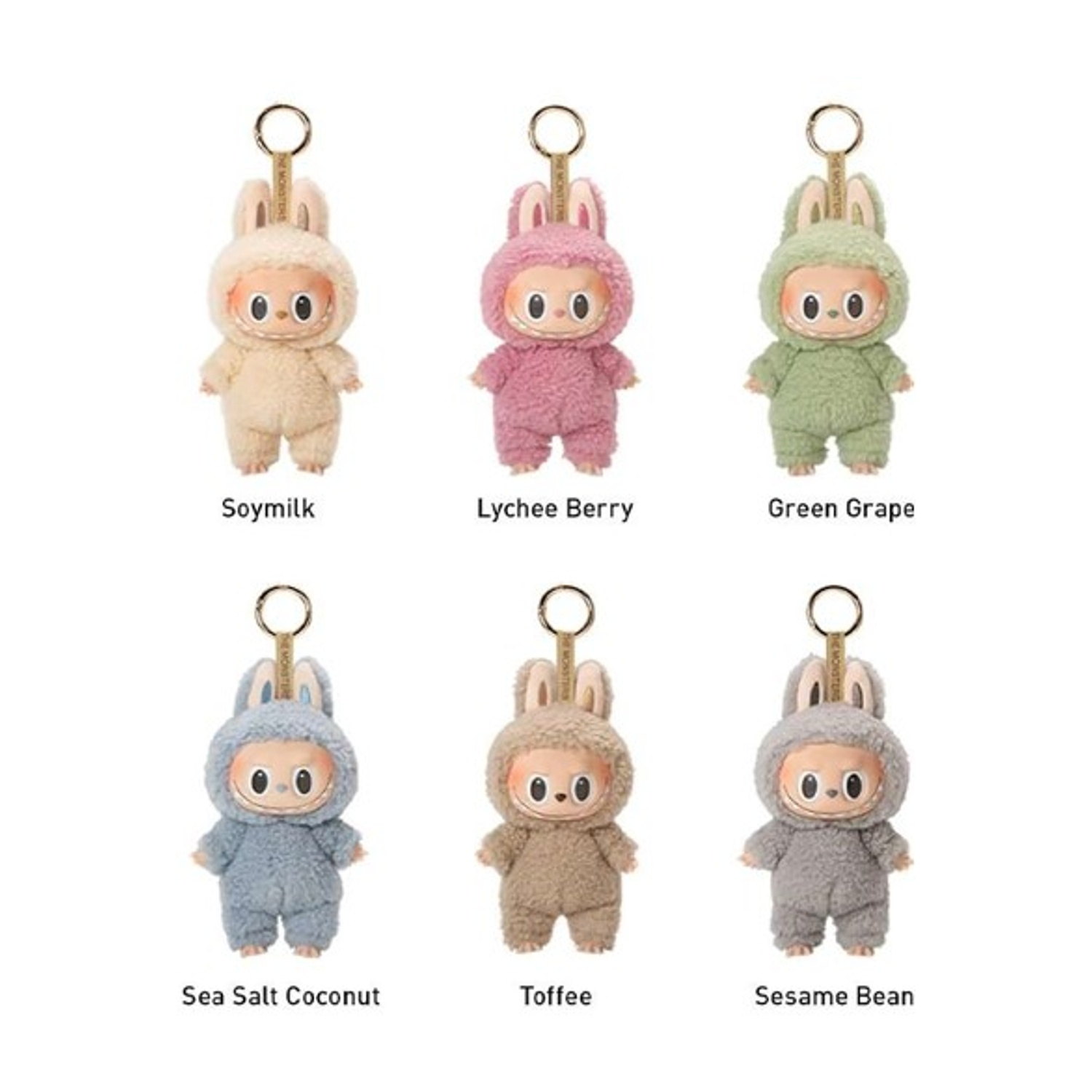 Sei portachiavi di peluche in diversi colori (beige, rosa, verde, blu, marrone, grigio) a forma di creatura simile a un coniglio.