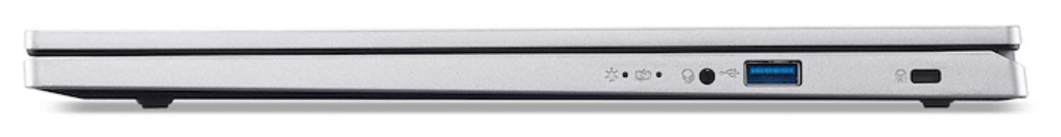 Vista lateral de una laptop plateada. Se ven puertos para USB, auriculares y alimentación. La laptop está sobre fondo blanco.