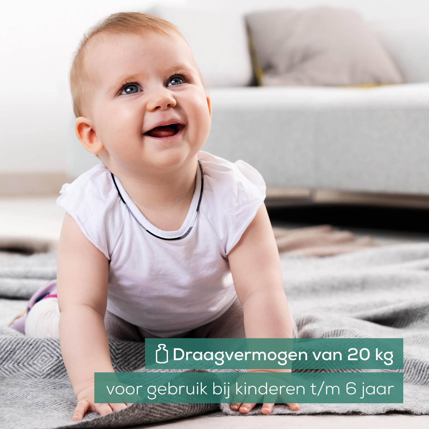 A baby crawls on a patterned blanket, looking up and smiling. Text on a green banner states weight capacity for children.