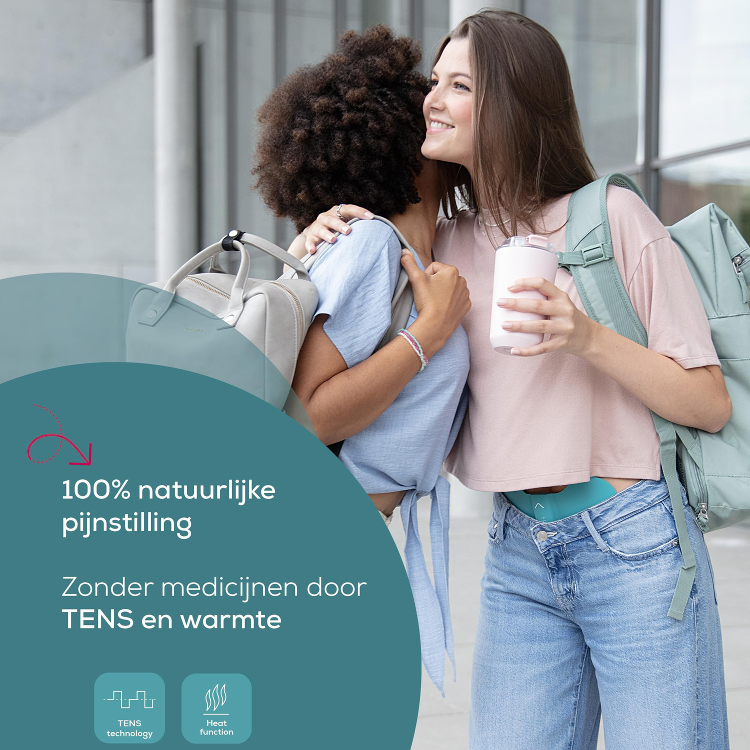 Two women hug, one holds a pink bottle, both wear backpacks. Text reads: 100% natural pain relief, without medication through TENS and heat.