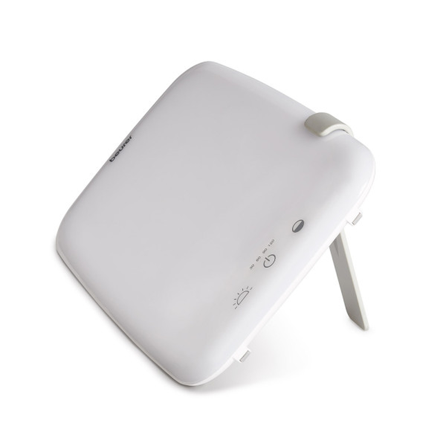A white Beurer light therapy lamp. It has a stand, power button, and timer settings. It's on a white background.