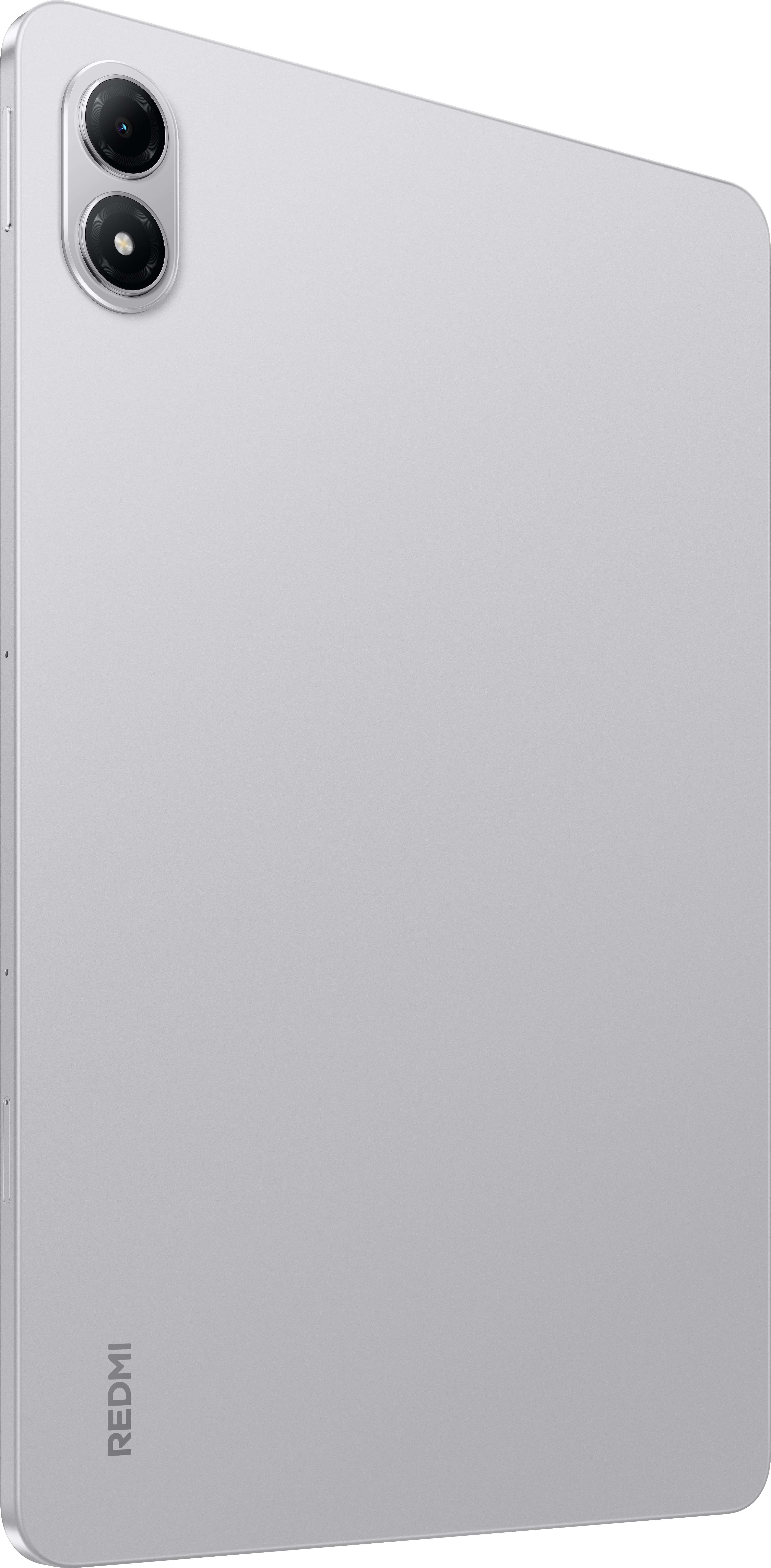 Srebrny tablet z aparatem z dwoma obiektywami. Widoczne logo Redmi. Pokazano go z boku. Urządzenie jest prostokątne.