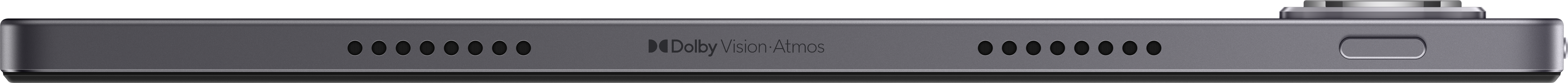 Widoczna jest strona szarego tabletu. Posiada otwory, tekst 'Dolby Vision-Atmos' i port. Na górze pierścień aparatu.