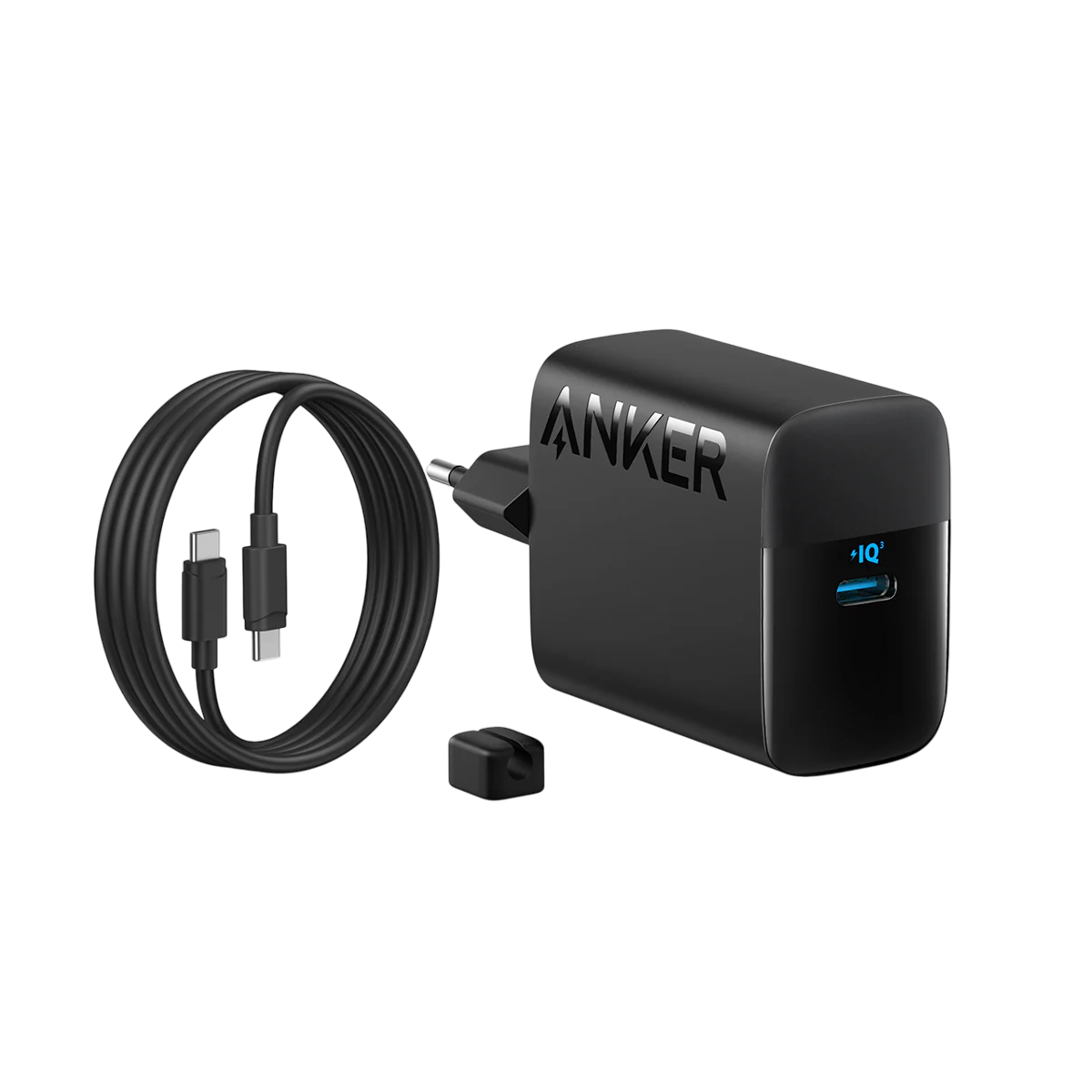 Siyah bir Anker şarj cihazı ve USB-C kablosu. Şarj cihazında Anker logosu ve 'IQ' yazıyor. Arka plan siyah.