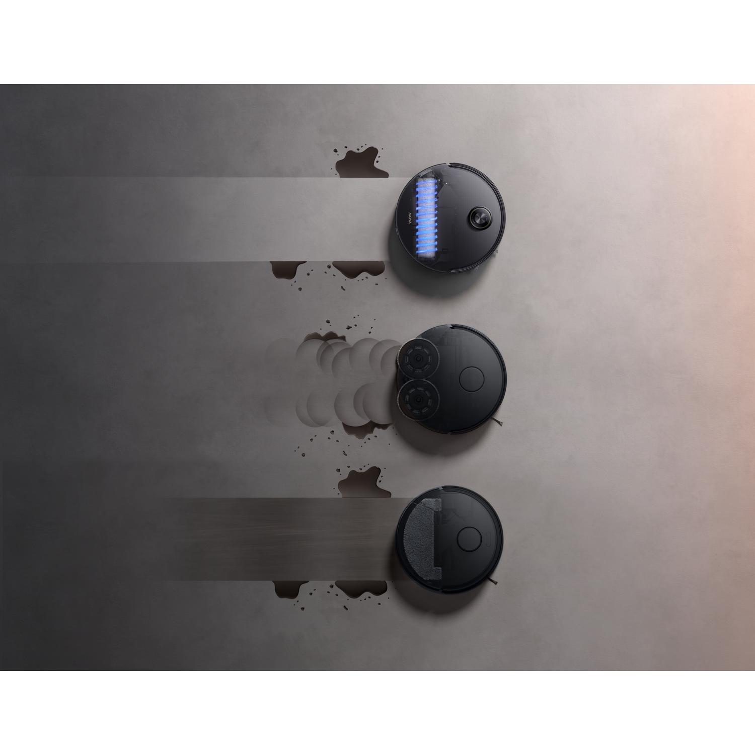 Three robot vacuums cleaning a floor with spills. The top one is active, the middle one is cleaning, and the bottom one is ready.