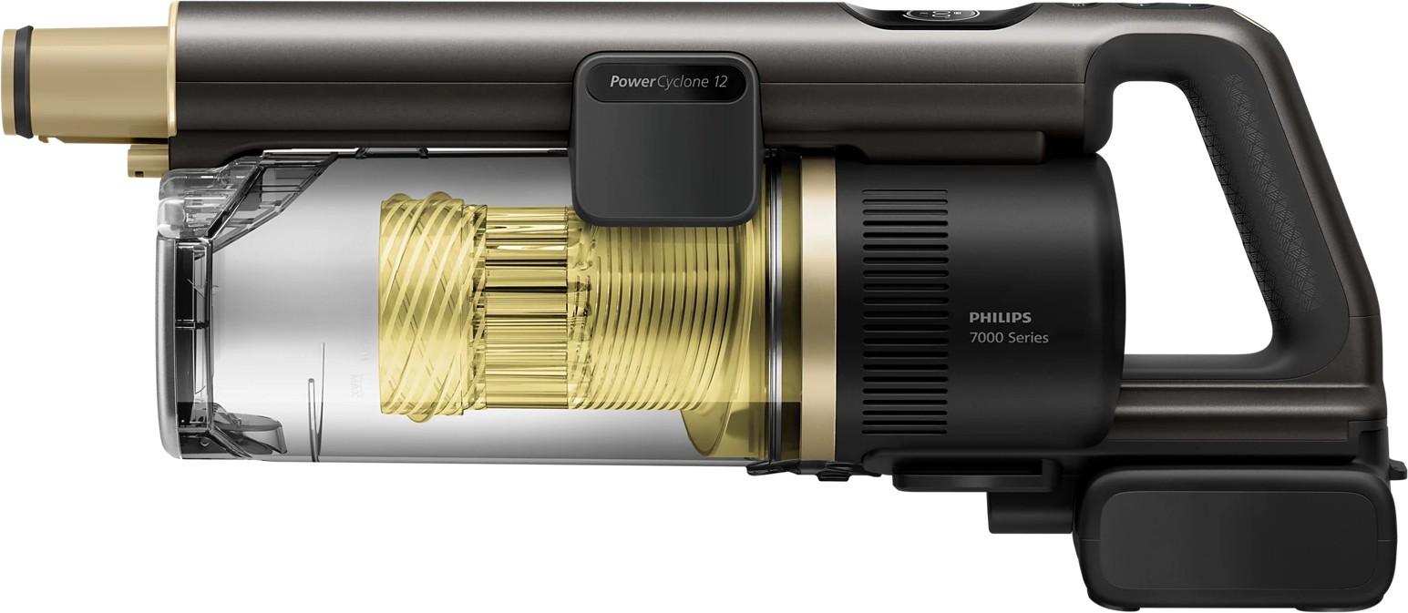 Ein kabelloser Staubsauger der Philips 7000er Serie. Er hat einen transparenten Staubbehälter, goldene und dunkelgraue Akzente und einen Griff.