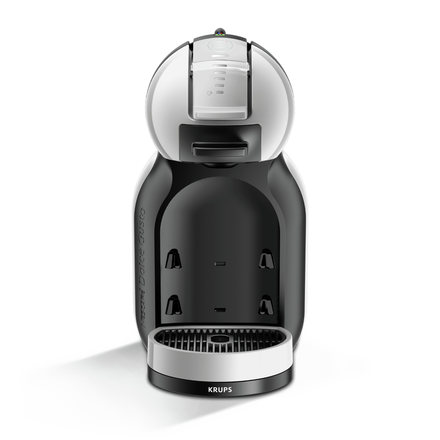 A black and white Dolce Gusto coffee machine by Krups. It features a cylindrical top section and a base with a drip tray.